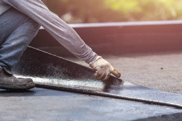 Professional Basement Waterproofing technician working in Clanton, AL
